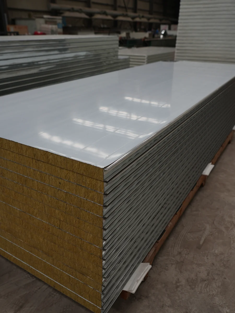Stacked metal-faced panels with visible fibrous core edges